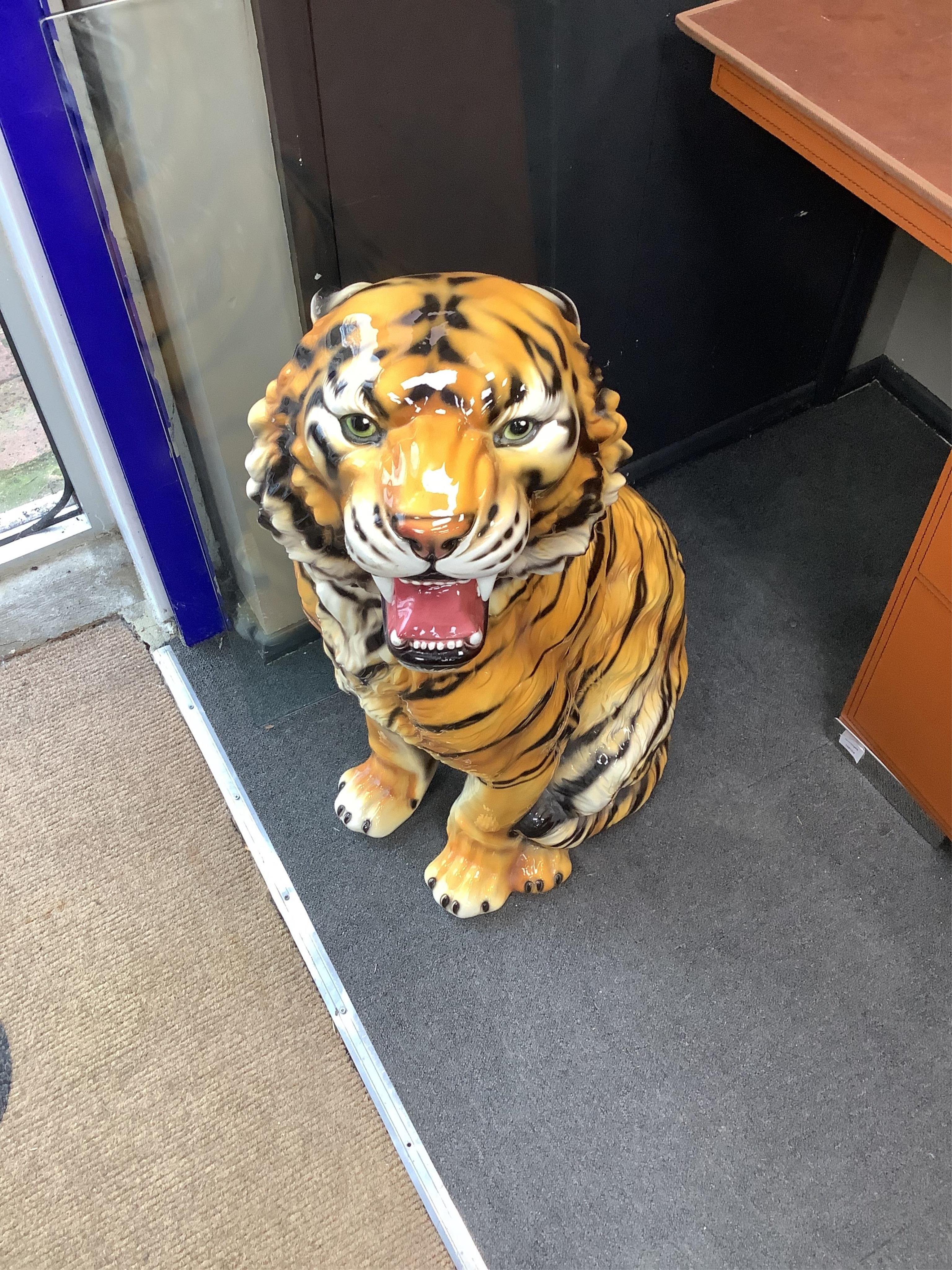 An Italian majolica seated tiger, height 90cm. Condition - good